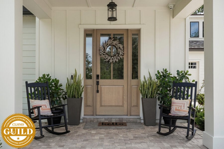 certified luxury home marketing specialist logo Dana Merrill, John Merrill Homes front door