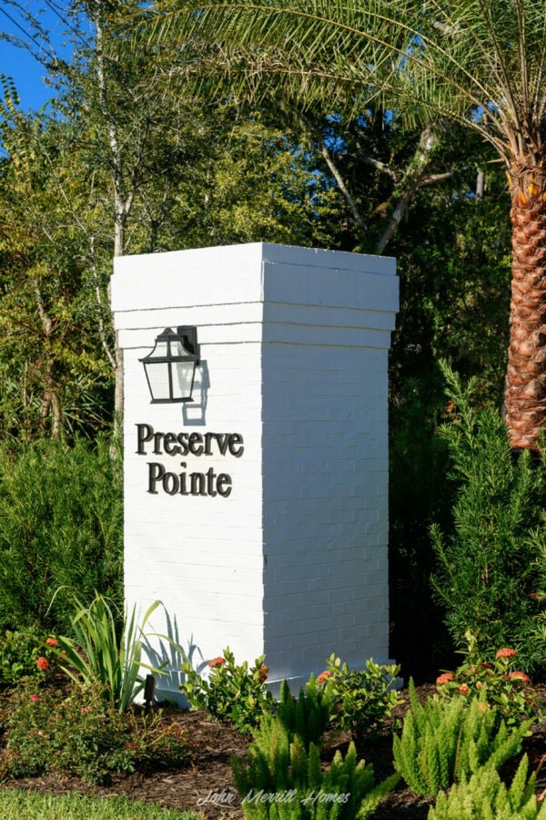 Preserve pointe entrance sign with landscaped plants and greenery in the foreground.